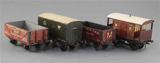 A set of four: NE guards van No 71911, GWR box van No 105673, 7 plank open wagon marked